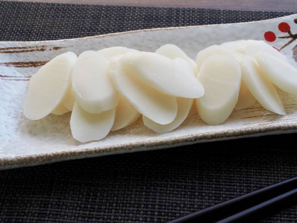 istock Korean food, Bar rice cake and folding fan 1133691656