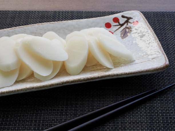 istock Korean food, Bar rice cake and folding fan 1133691659