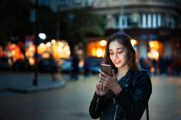 istock Young girl using her smartphone 1133692550