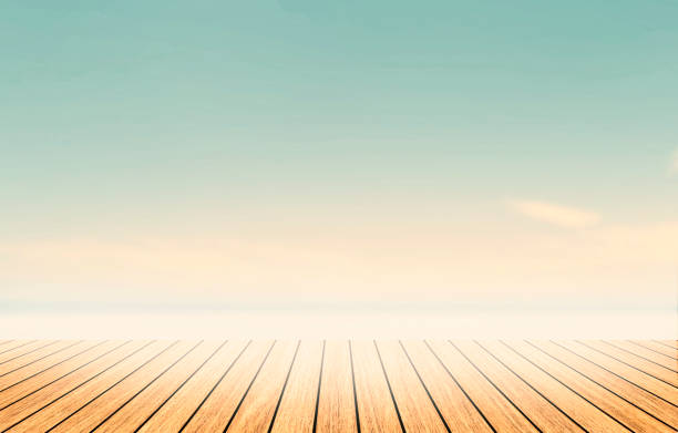 istock Perspective border wood table beach outside on calm blue sky in spring background concept for wide dinning board on summer landscape wallpaper bacground, mockup promotion product. 1133692615
