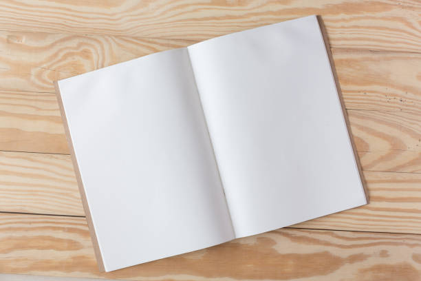 istock Abstract Blank one white paper on wooden table top view background concept for empty letter business sheet, plain brochure mock up template, flyer card, notebook frame notepad. 1133694625