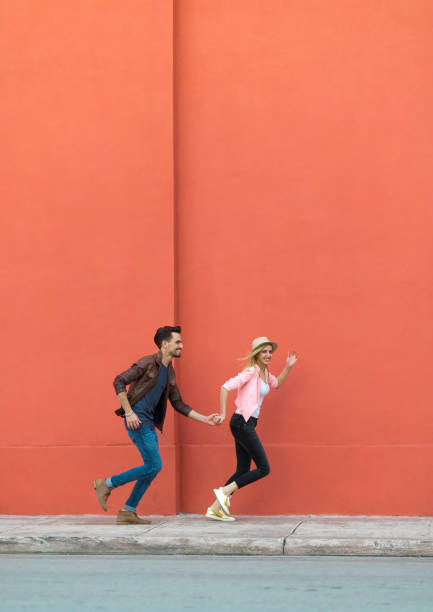 istock Couple running in the city 1133704311