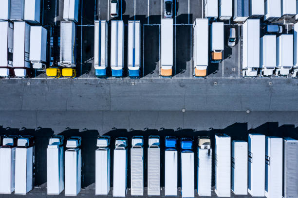 istock Parking lot with large trucks and buses 1133710351