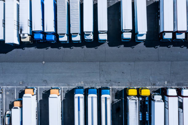 istock Parking lot with large trucks and buses 1133710356