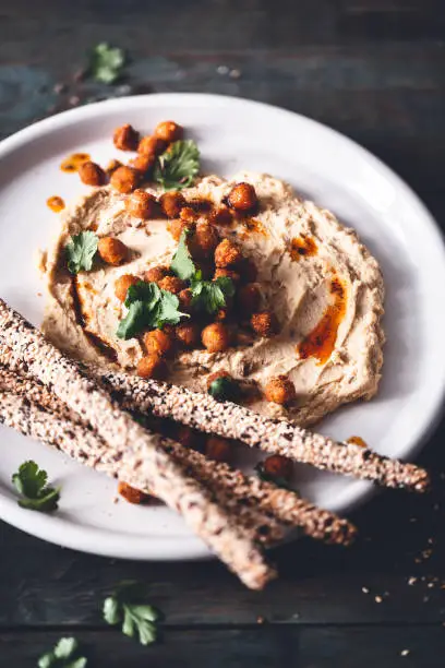 Chickpea hummus, roasted chickpeas with Paprika and Gressin. Vegetarian Dish