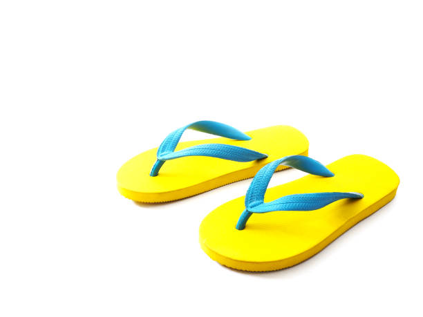 istock yellow and blue rubber flip flop shoes 1133713652
