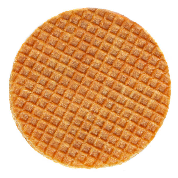 Dutch Caramel waffle, round stroopwafel isolated on a white background