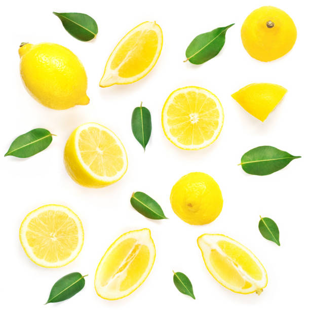 istock Lemon slices with leaf isolated on white background. Tropical abstract creative Summer background.  Flat lay, top view. 1133717765