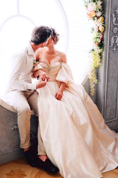 istock Two young lovers getting engaged in secret.Wedding ceremony concept. 1133717898