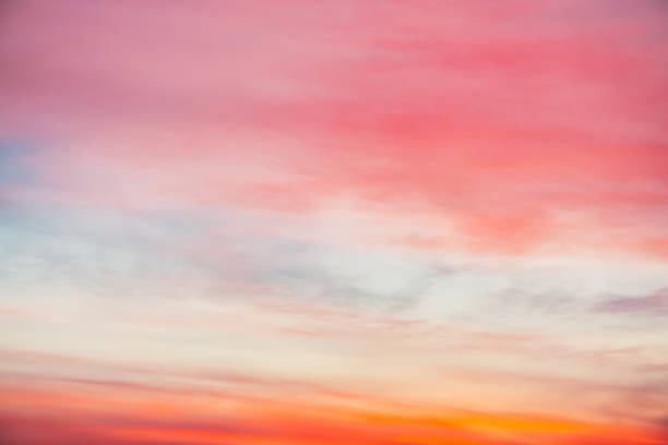 istock Sunset sky with pink orange light clouds. Colorful smooth blue sky gradient. Natural background of sunrise. Amazing heaven at morning. Slightly cloudy evening atmosphere. Wonderful weather on dawn. 1133719605
