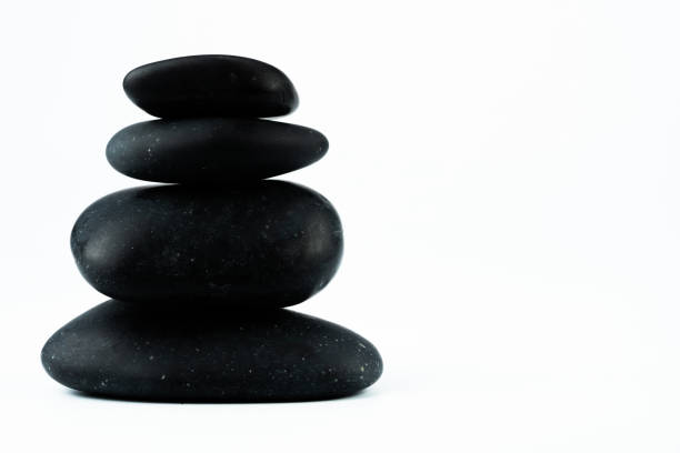 istock massage equipment and black stones 1133721725