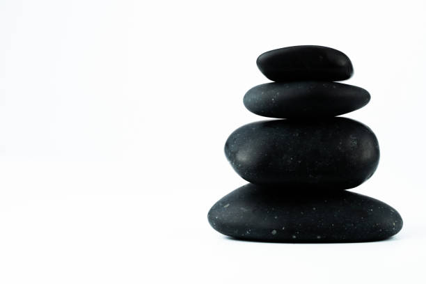istock massage equipment and black stones 1133721778