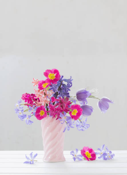 istock beautiful spring flowers in pink vase 1133723111