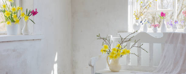istock beautiful spring flowers in white vintage interior 1133723113