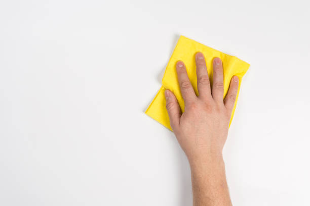 istock Man's or woman's hand cleaning on a white background 1133724779