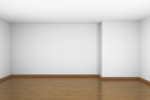istock White empty room with brown hardwood parquet floor 1133729528