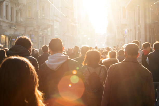 istock Blurred crowd of unrecognizable at the street 1133731427