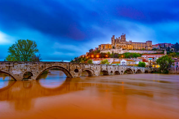 istock Cathedral and Pont Vieux at night. Beziers 1133734100