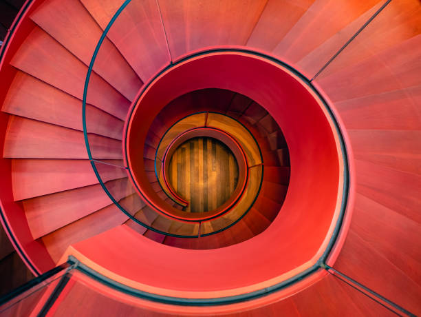 istock Spiral staircase Interior Modern Architecture detail Red colour 1133735585