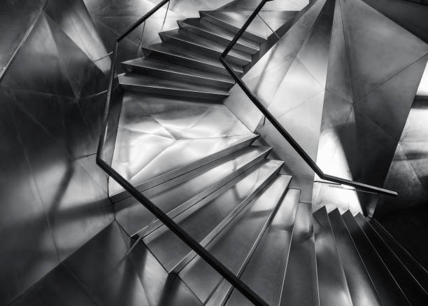 istock Spiral staircase silver metal colour Modern Building 1133735586