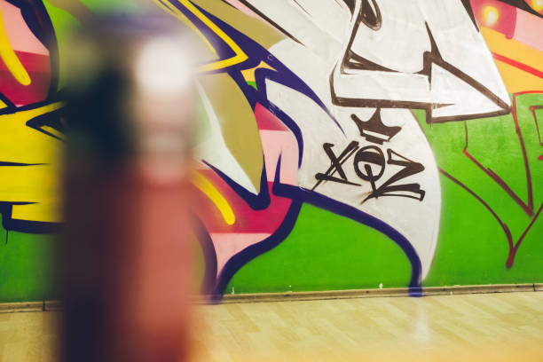 istock Colorful graffiti on an orange wall 1133737137