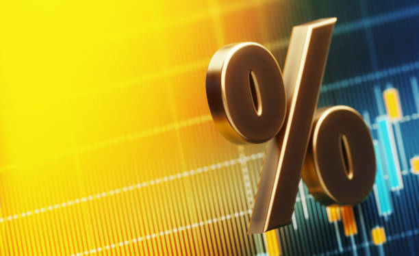 istock Percentage Sign Standing Over A Financial Graph 1133738775