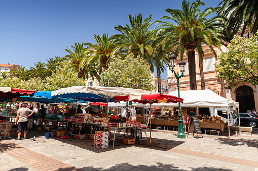 Ajaccio, France - July 6, 2015: Ordinary people and tourists are on central marketplace in Ajaccio city, Corsica island