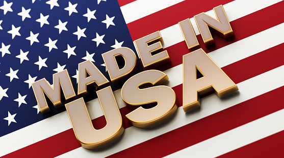 Made in USA text on American flag. Horizontal composition with copy space.