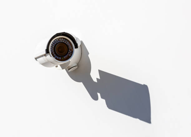 istock Modern mini CCTV camera on the wall of an industrial building 1133745736