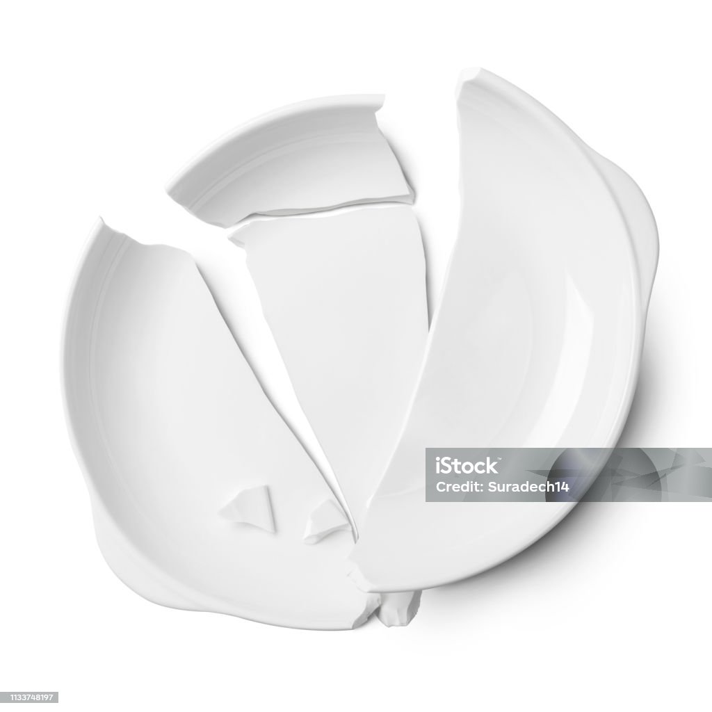 Broken white ceramic plate on a white floor. Broken white ceramic plate on a white floor and shadow with clipping path. Broken Stock Photo