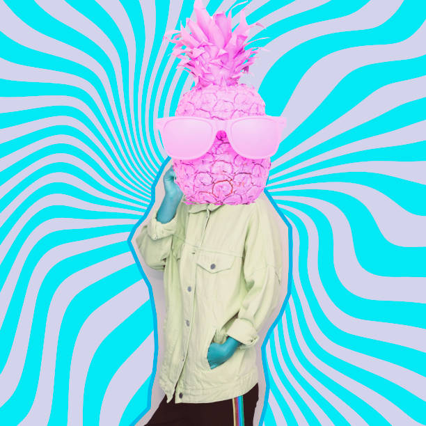 istock Female alien model with the big pink pineapple in sunglasses instead head on psychedelic stripes background. 1133754329
