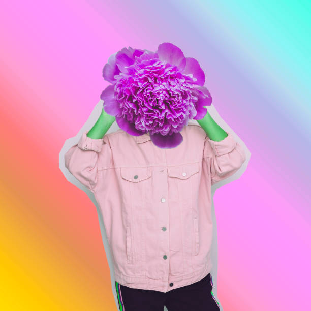 istock Female alien model with the big flower instead  head on gradient background. 1133754345