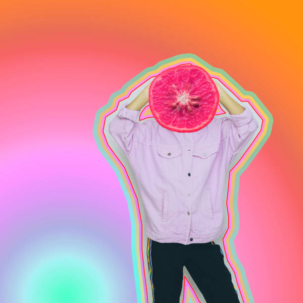 istock Female alien model with the big half of orange fruit instead  head on psychedelic gradient background. 1133754351
