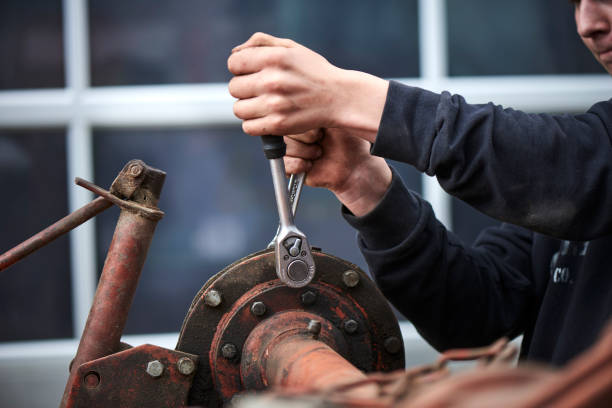 istock A young farmer repairing farmer equipment 1133754672