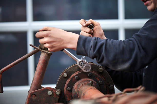 istock A young farmer repairing farmer equipment 1133754686