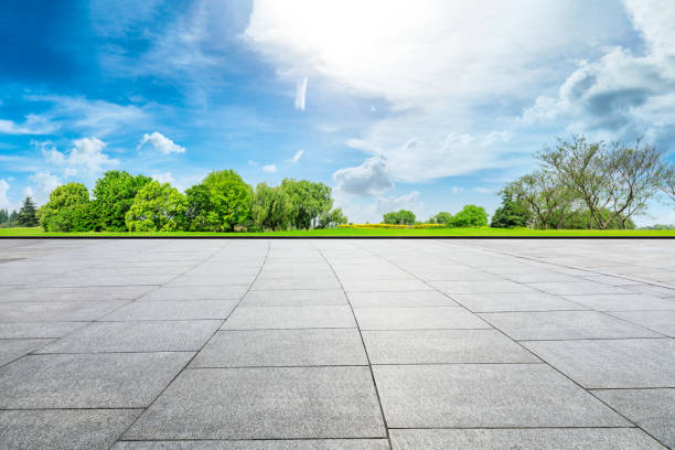 istock Empty square floor and green forest in city park 1133754791