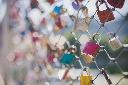 Colourful love locks on a bridge