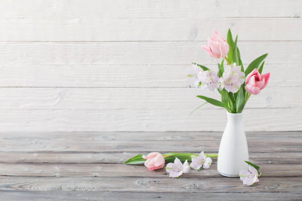 istock spring flowers in white vase 1133757306