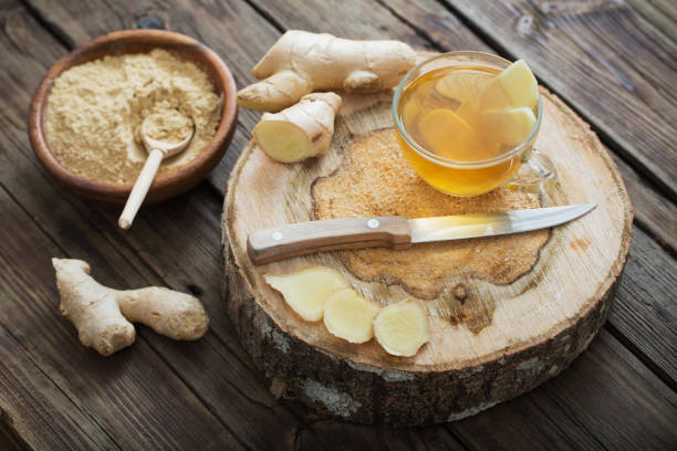 istock ginger tea on old wooden background 1133757368