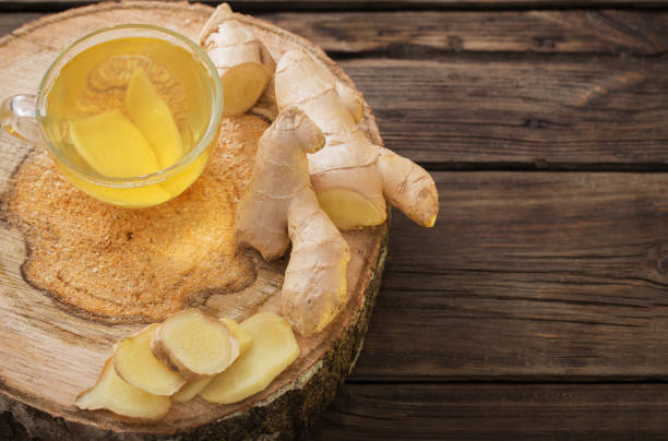 istock ginger tea on old wooden background 1133757371