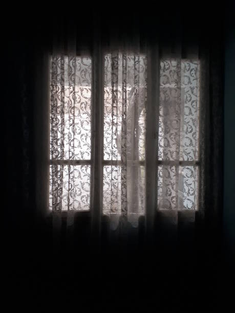Dark Room and Curtain Window