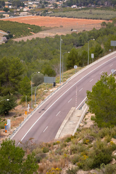 istock Highway in Spain surrounded by mountains 1133759079