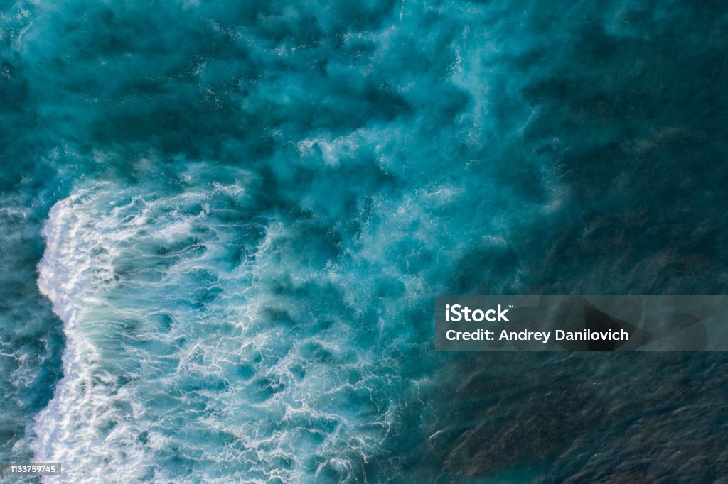 Ocean surf from above Water surface background. Aerial drone shot Sea Stock Photo