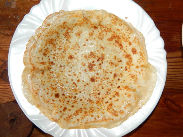 istock Pancakes on a new cast-iron skillet on Shrovetide 1133759840