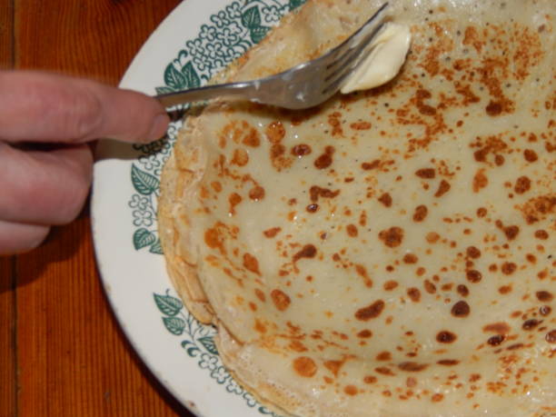 istock Pancakes on a new cast-iron skillet on Shrovetide 1133759878