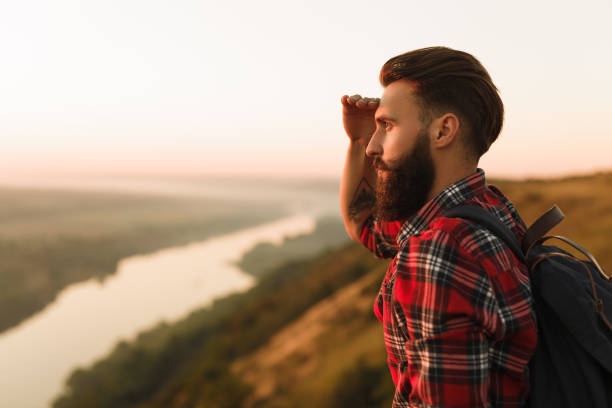 istock Bearded traveler looking at distance 1133759924