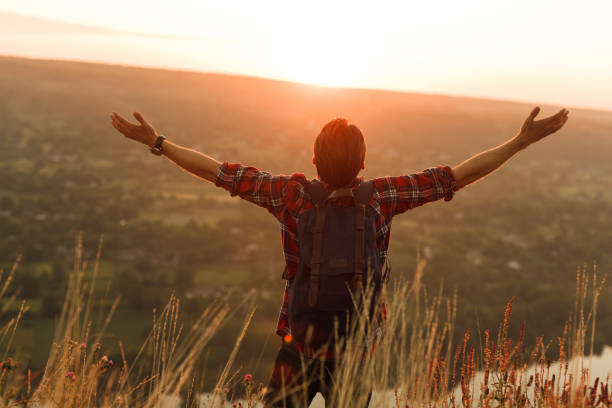 istock Man enjoying freedom while traveling in nature 1133759929