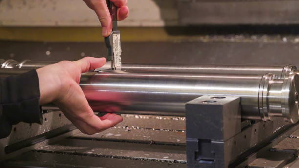 istock Two metal tubes being measured on 1133760004
