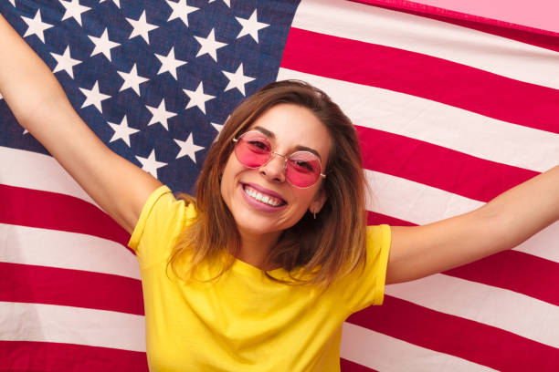 istock Bright girl with American flag 1133760268