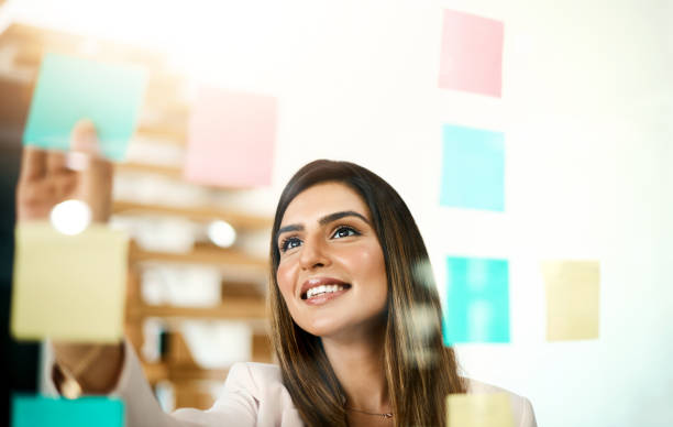 istock She's beaming with fresh ideas to share with the team 1133760561